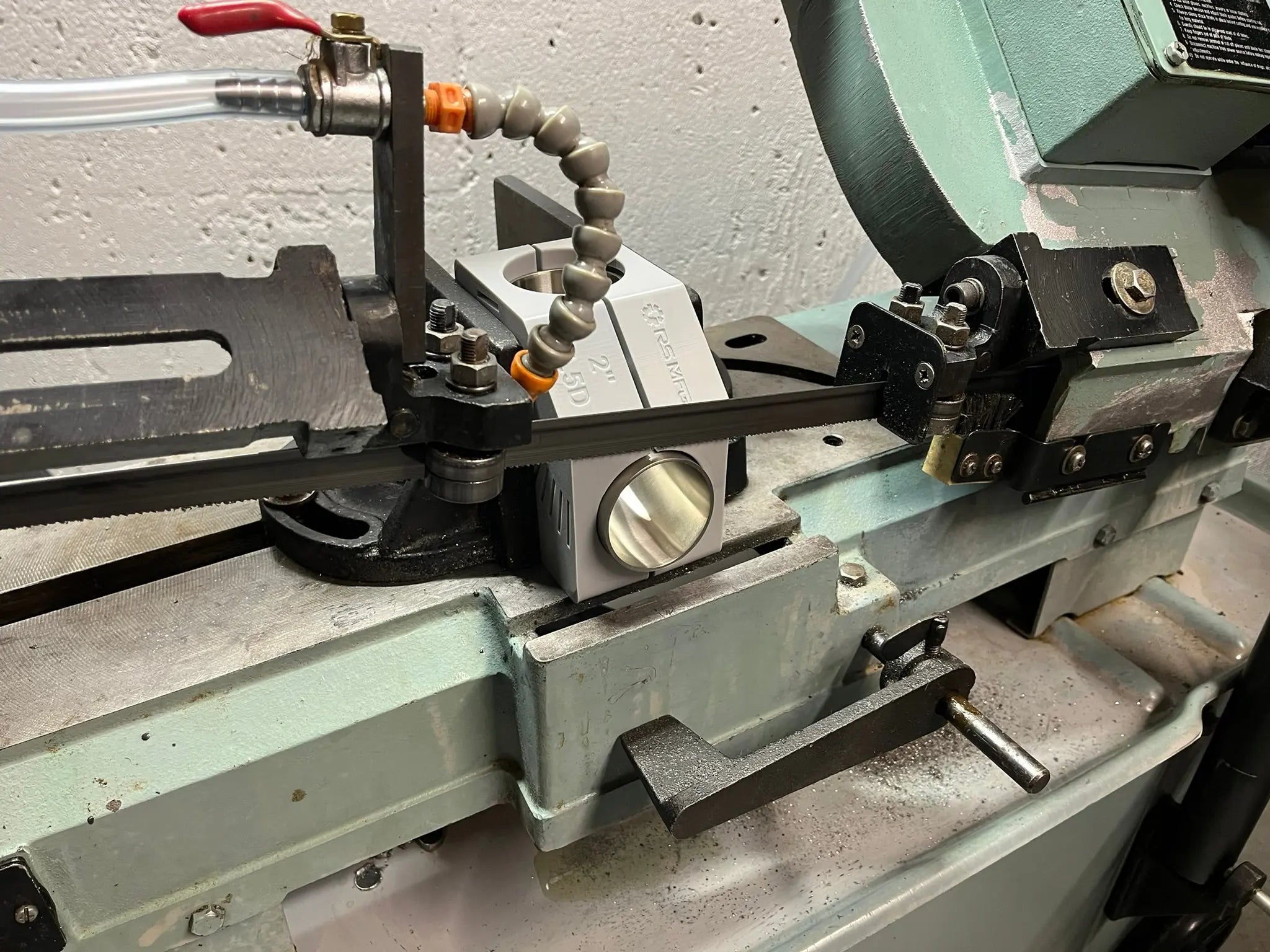 3d printed cutting jig in bandsaw